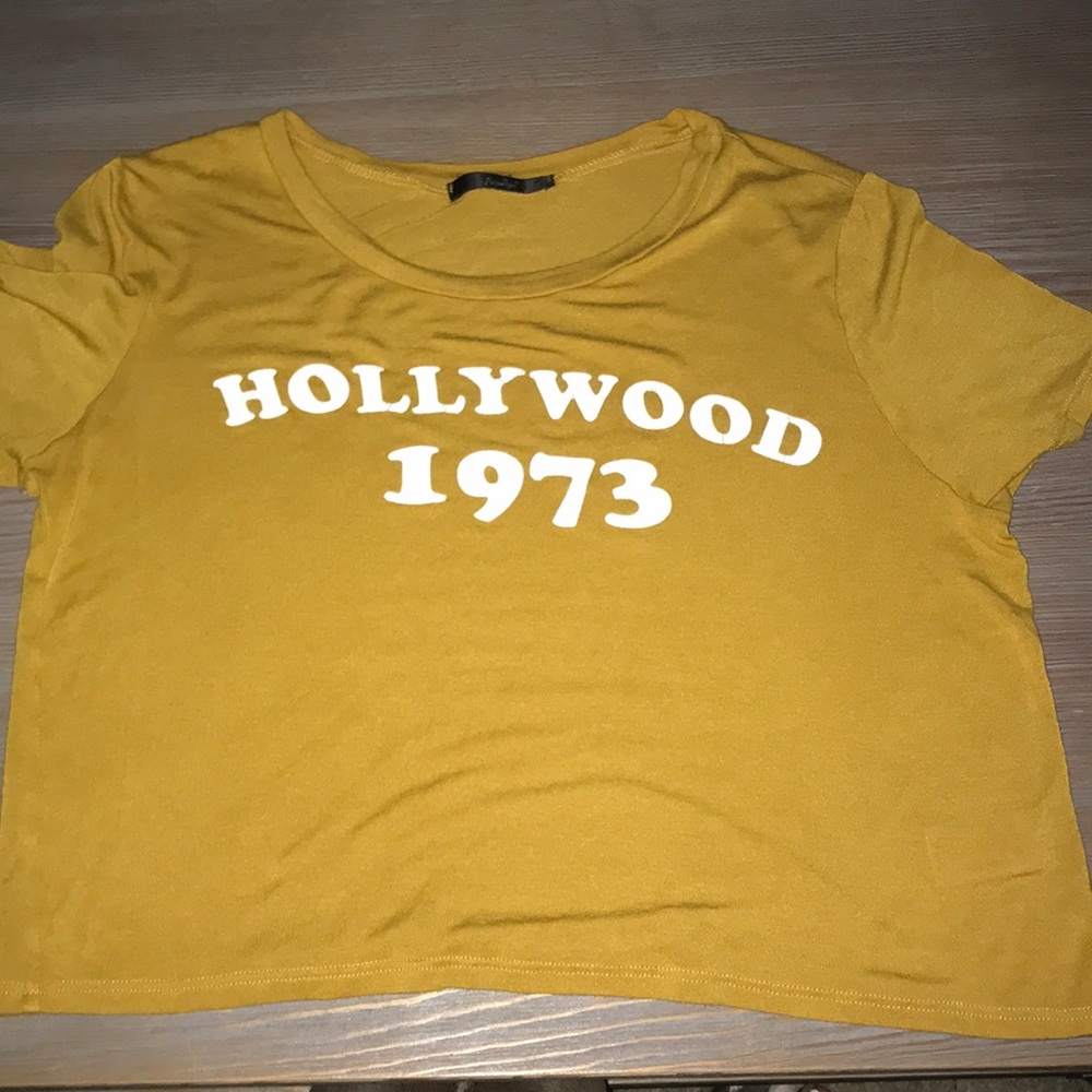 yellow shirt that is slightly cropped!
